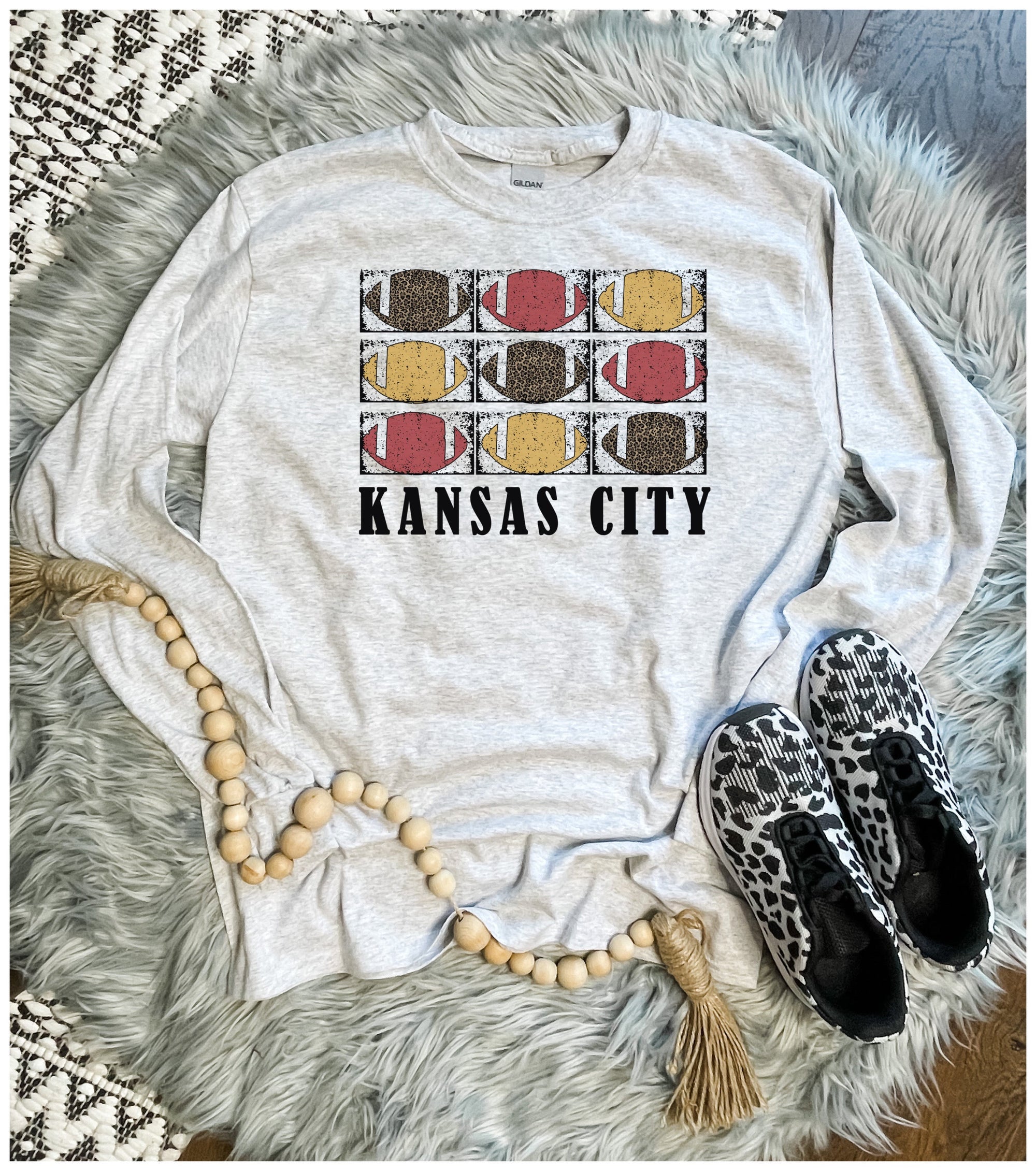 **HALFTIME DEAL** Distressed Footballs Kansas City Ash Long Sleeve Tee