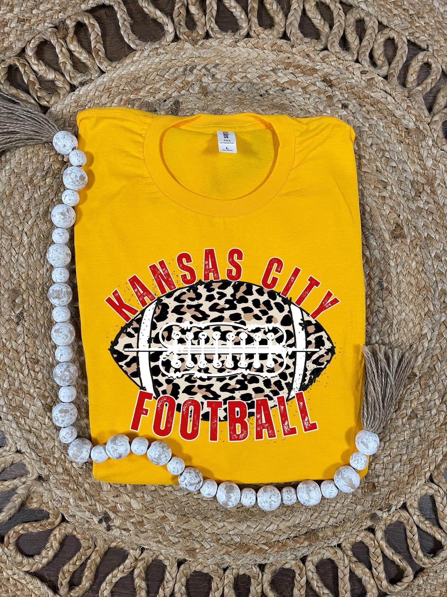 Oval Red Kansas City Leopard Football Gold Tee